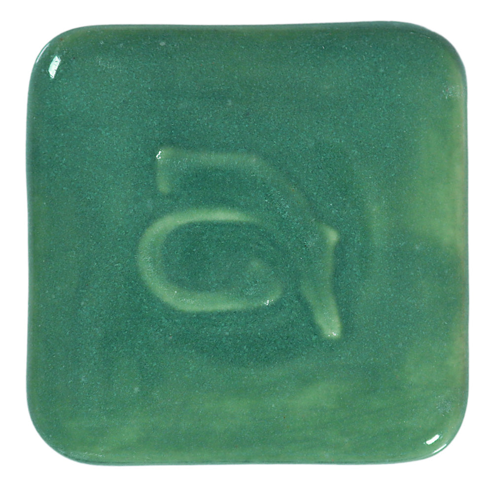 Abbots Cascade Green glaze swatch showing reactive glossy surface with reactive, pooling, layered character.