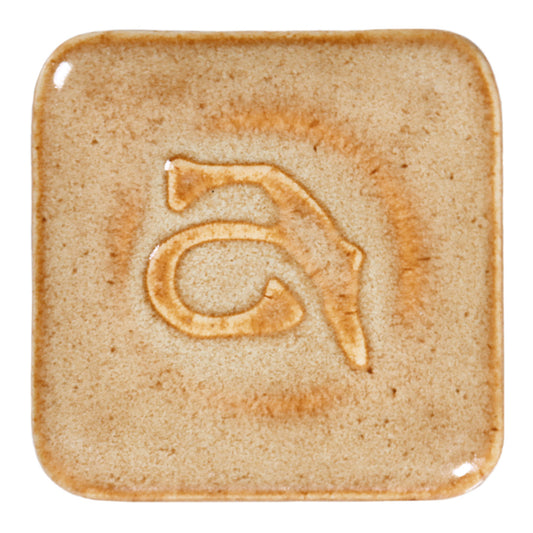 Abbots Haystack glaze swatch showing the glaze breaks gently across edges, revealing warmer tones that enhance form and detail.