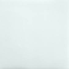 A large white porcelain-like clay block, to be used for pottery or ceramic arts.
